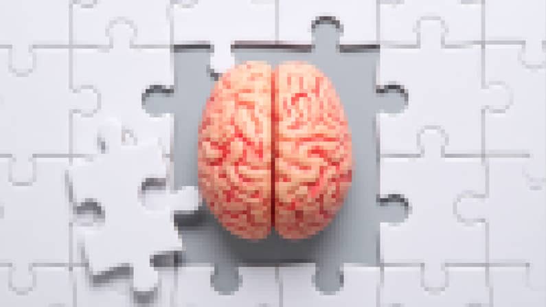 Un cerveau au milieu d'un puzzle afin d'illustrer les jeux de stratégie et la réflexion dans les jeux vidéos.